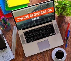 Online Registration Concept on Modern Laptop Screen.